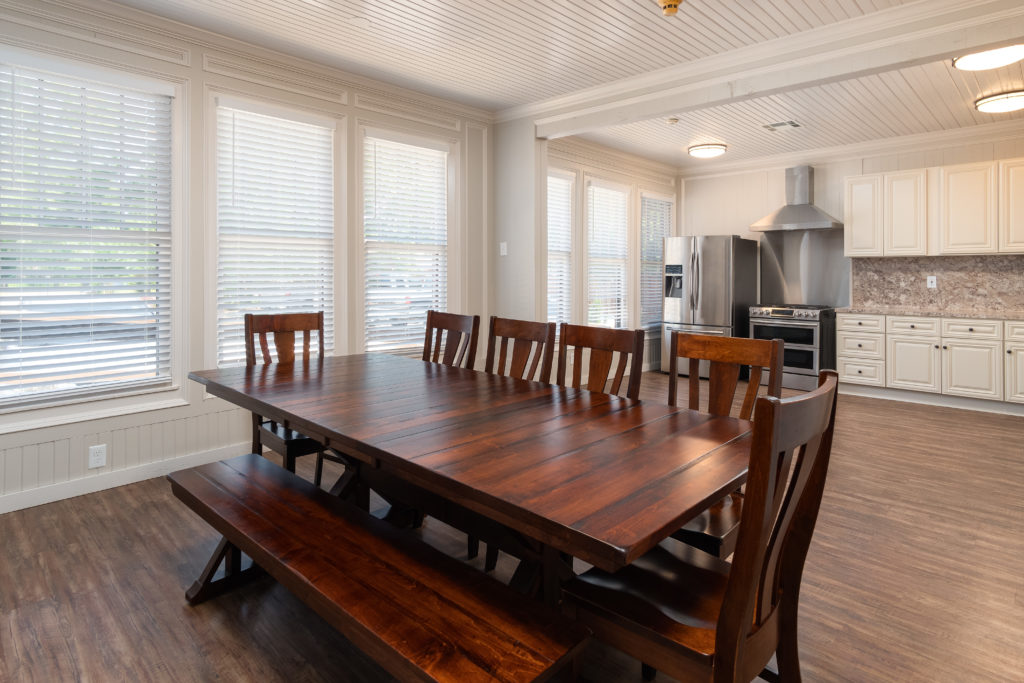 men's facility dining area and kitchen