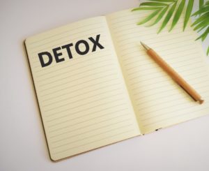 Detox word written in a notebook